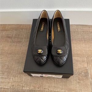 CHANEL Black Quilted Flats with Gold Accents